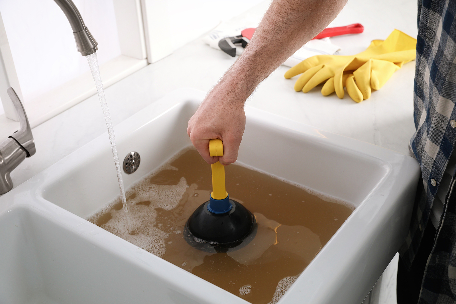 How to Unclog a Sink Drain with a Plumber's Snake