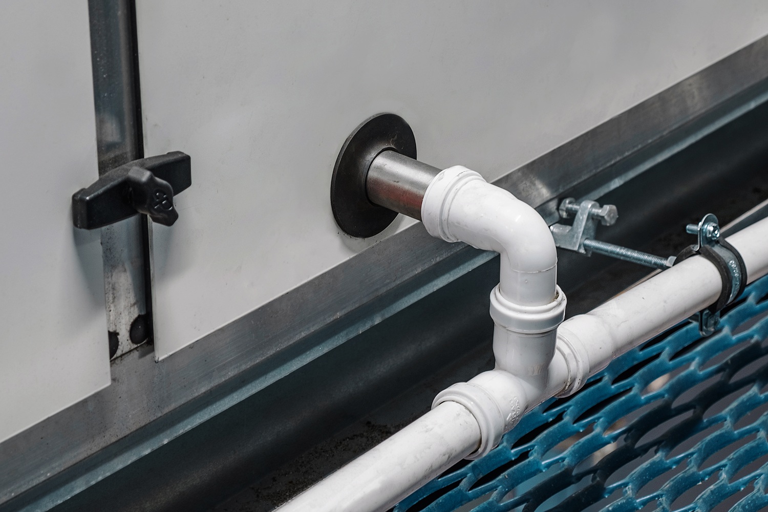 Why a Clogged AC Drain Line Becomes a Plumbing Emergency in Summer Heat